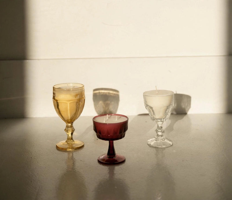 A hand-poured taper candle