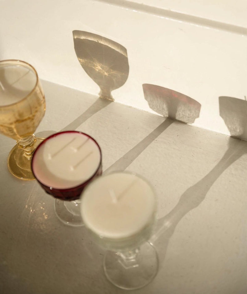 A candle poured from something they once held