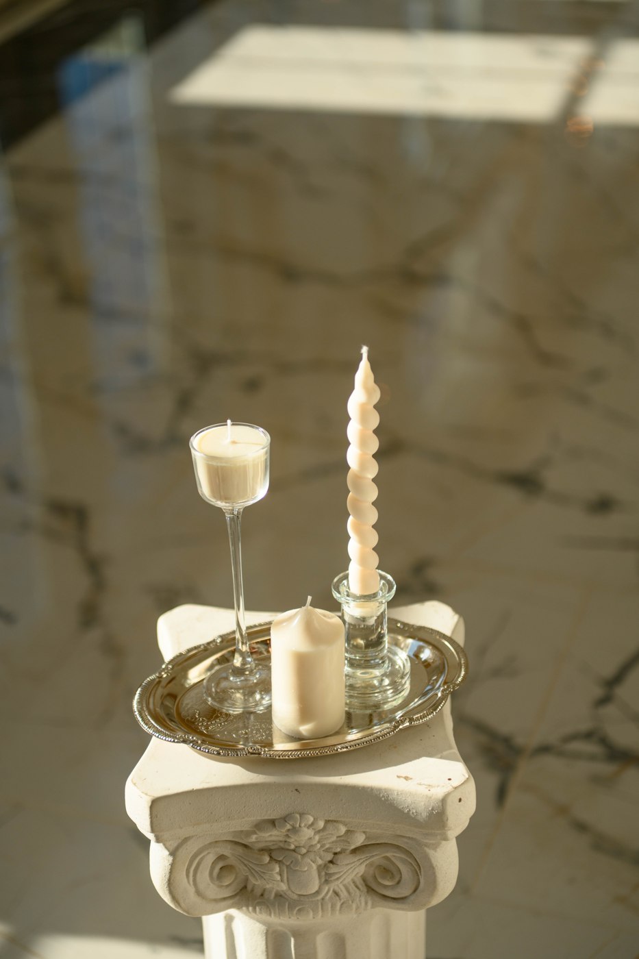 LaRue & Co. wedding candle set on a glass tray