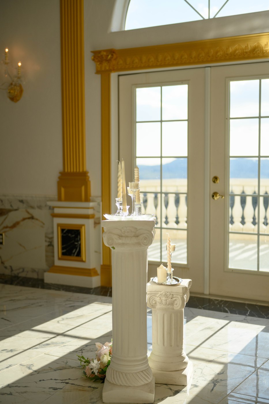 LaRue & Co. candles on a marble pedestal